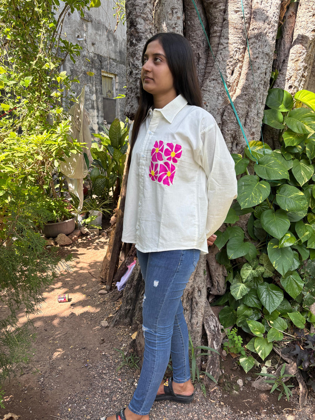 A white flowery shirt