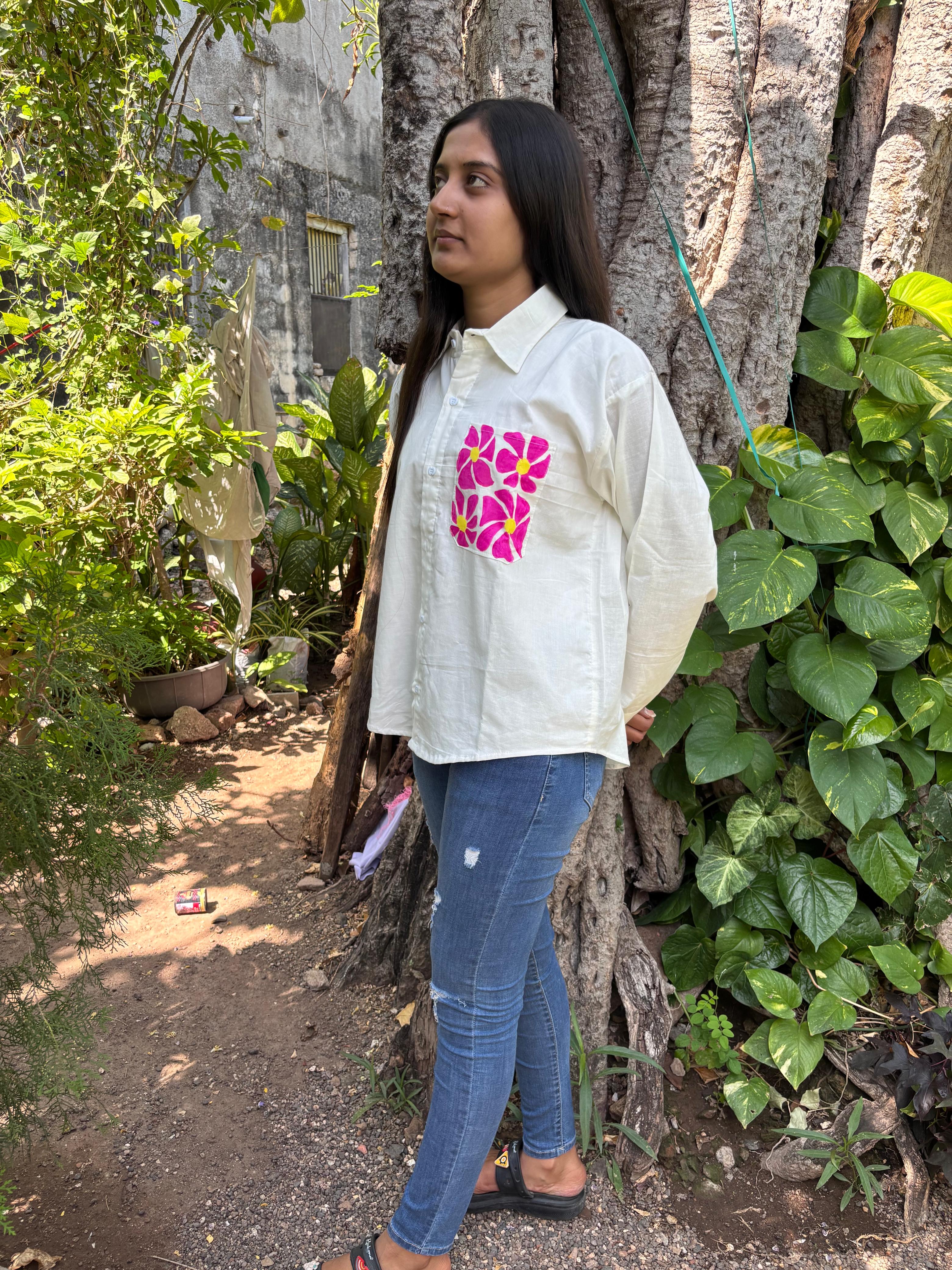 A white flowery shirt