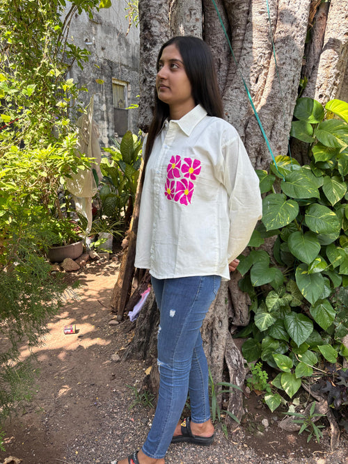 A white flowery shirt